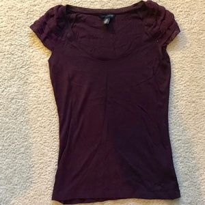 Beautiful basic tee with ruffled shoulder